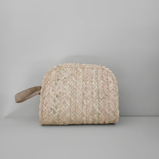 Woven palm cosmetic pouch by Khoos