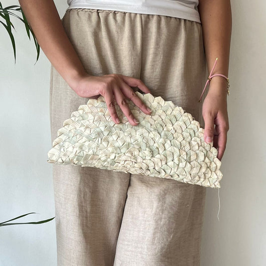 Wavy half moon clutch