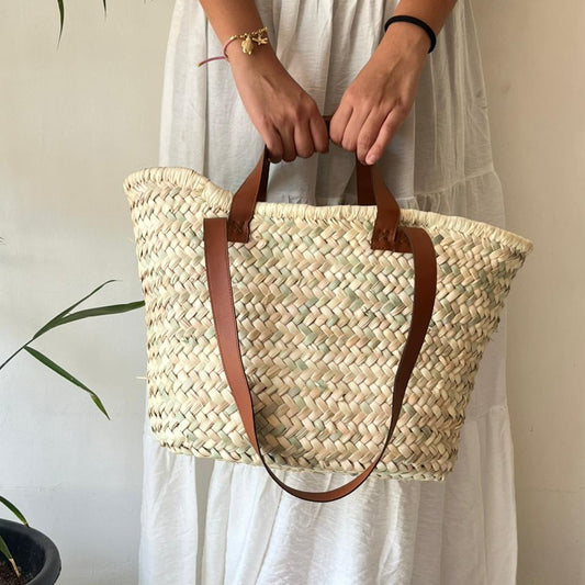 Woven bag with leather handle