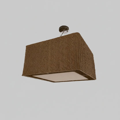 A rectangular pendant ceiling light with a woven natural-fiber textured shade, suspended from a metal canopy on a white ceiling in an indoor room.