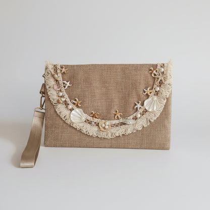 Seashell embroidered clutch