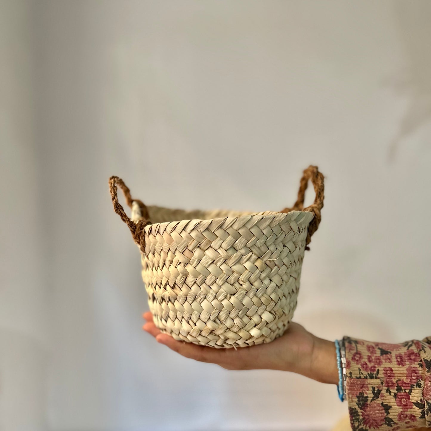 Basket with coir handles