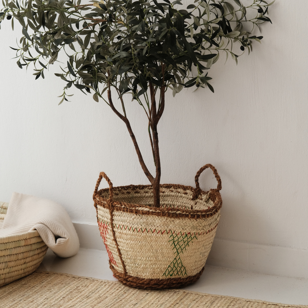 Woven basket with colored strings