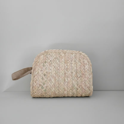 Woven palm cosmetic pouch by Khoos