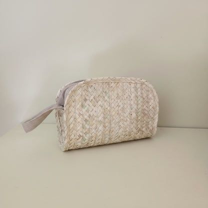Palm cosmetic pouch, side view — Khoos