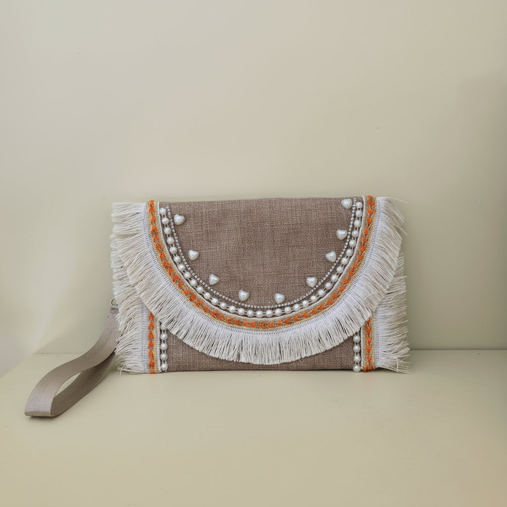 Boho embroidered fringe clutch by Khoos