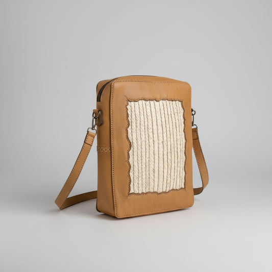 Leather and palm crossbody bag by Khoos