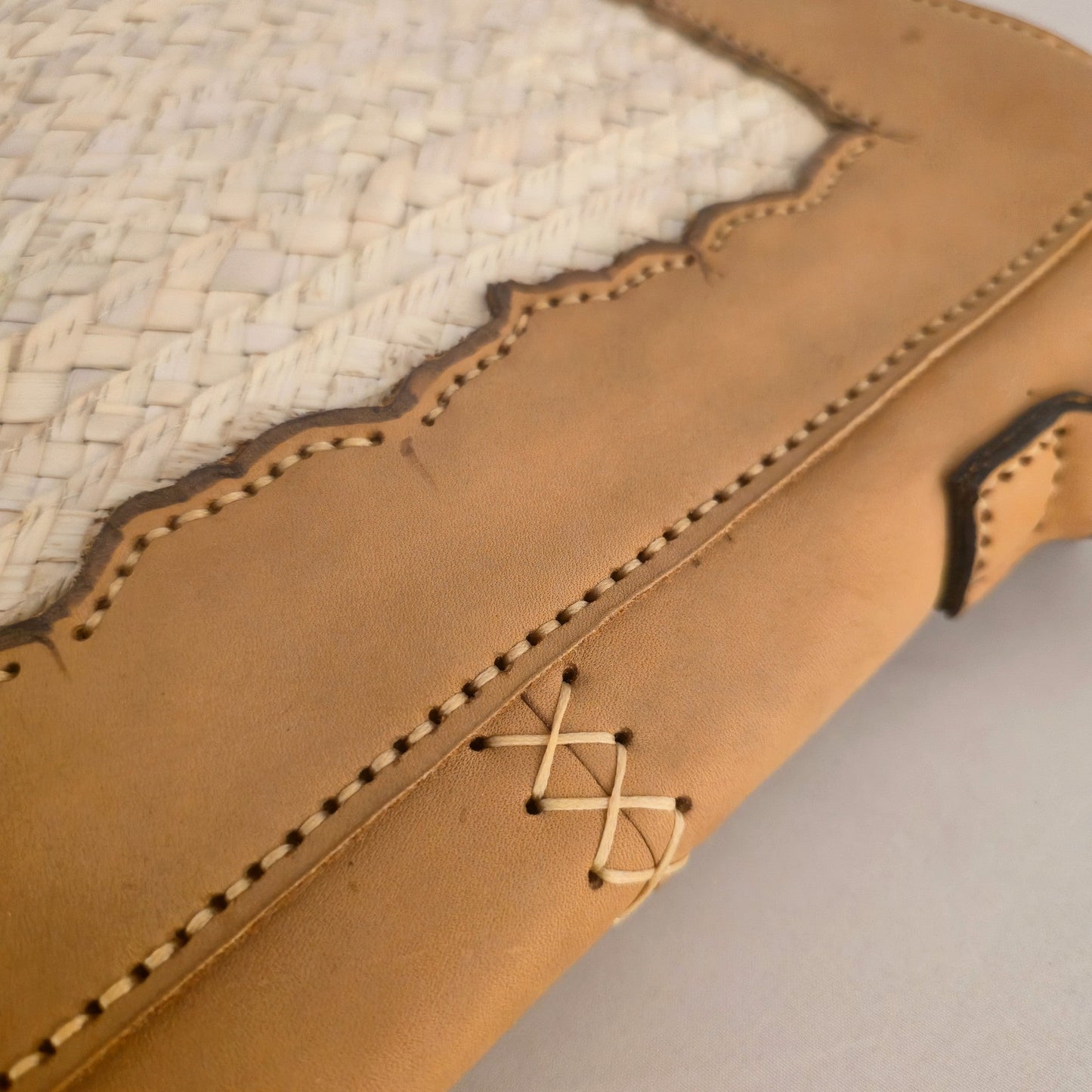 Leather and palm laptop sleeve by Khoos