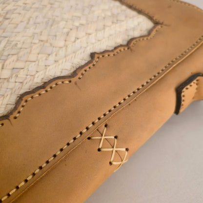 Leather and palm laptop sleeve by Khoos
