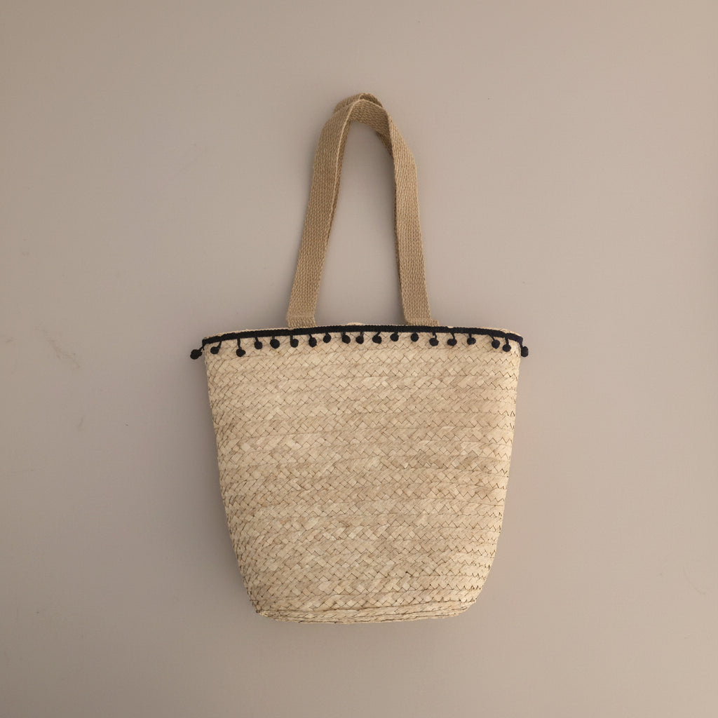 Palm tote with pom-pom trim by Khoos