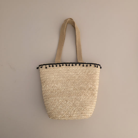 Palm tote with pom-pom trim by Khoos