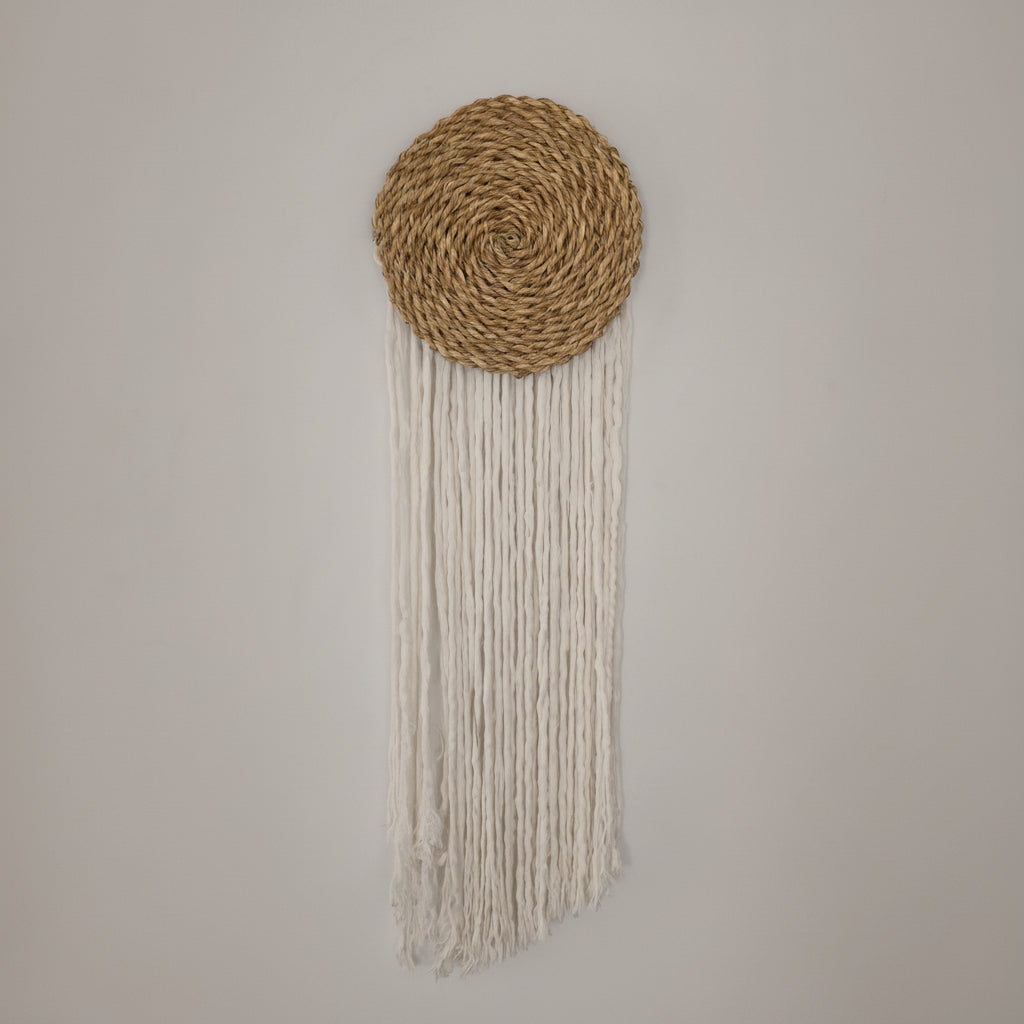 Macrame wall hanging with seagrass disc by Khoos