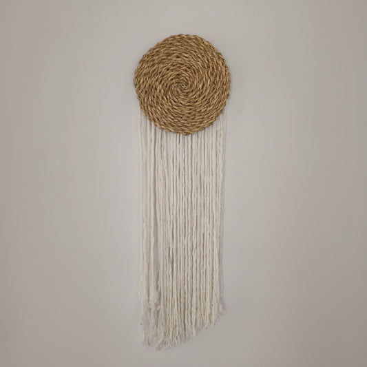 Macrame wall hanging with seagrass disc by Khoos