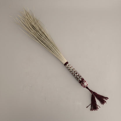 Palm frond hand broom by Khoos