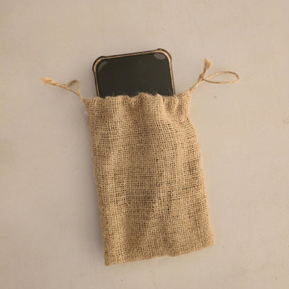 Jute drawstring phone sleeve by Khoos