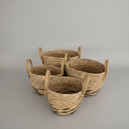 Set of small woven planter baskets with handles by Khoos