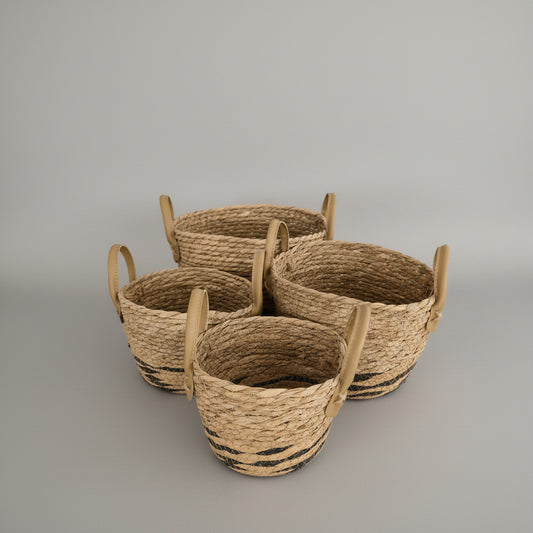 Set of small woven planter baskets with handles by Khoos