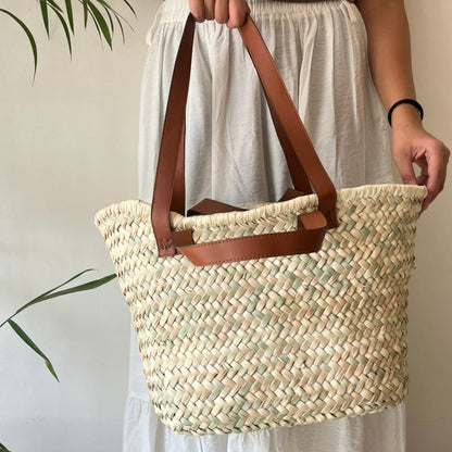 Woven bag with leather handle