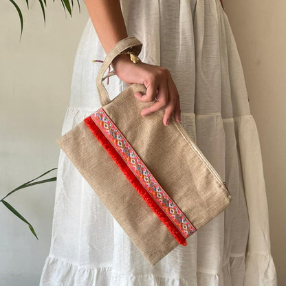 Jute clutch bag with strap holder