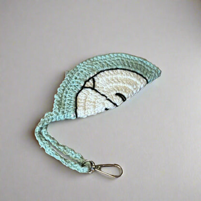 Mint hand-crocheted cotton sunglasses case with a cream centre, wrist strap and clip, 14 cm — Khoos