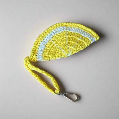 Lemon yellow hand-crocheted sunglasses case with a pale centre, wrist strap and clip, 14 cm — Khoos
