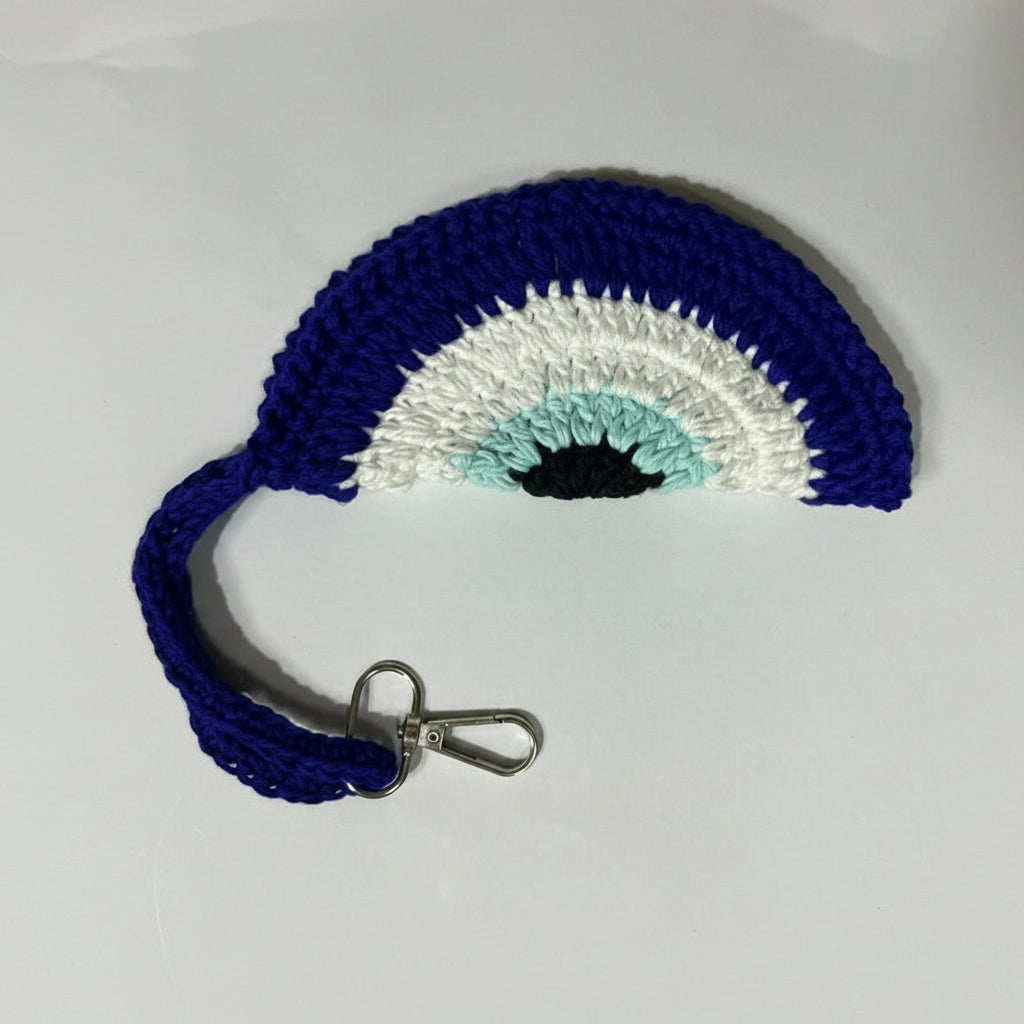 Nazra hand-crocheted sunglasses case in navy, white and pale blue rings, wrist strap and clip, 14 cm — Khoos