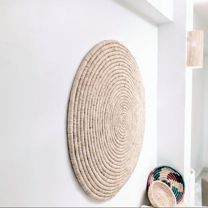 Handwoven palm wall decoration disc — Khoos